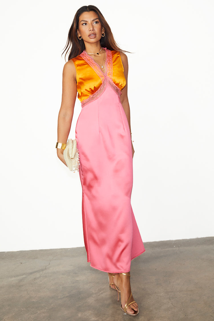 caption_Model wears Orange and Pink Sleeveless May Dress in UK size 10/ US 6