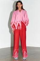Thumbnail for caption_Model wears Red And Pink Arden Trouser in UK size 10/ US 6
