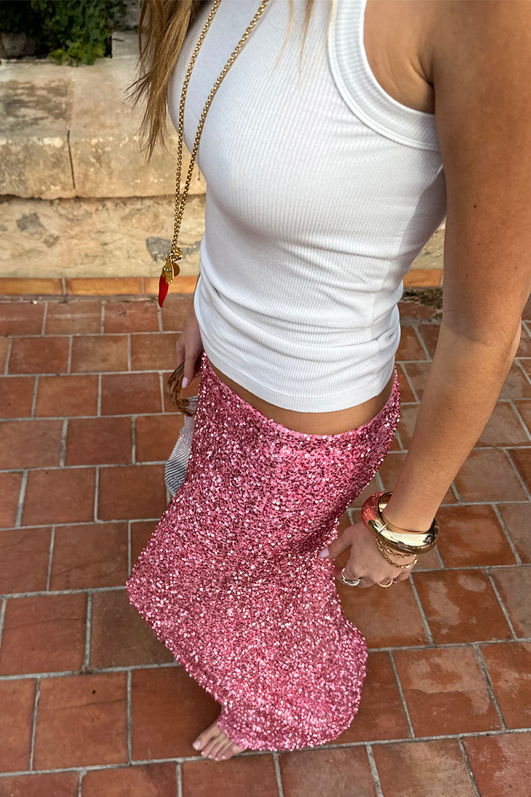 caption_Model wears Pink Sequin Dorris Skirt in UK size 10/ US 6