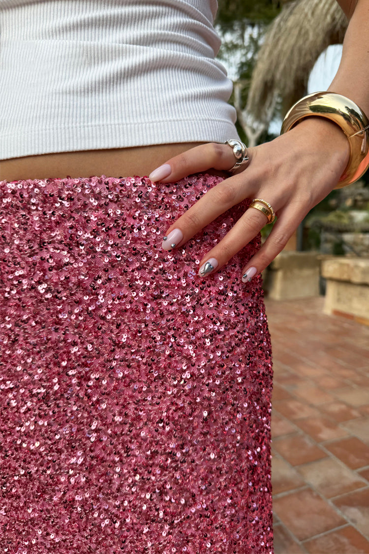 caption_Model wears Pink Sequin Dorris Skirt in UK size 10/ US 6