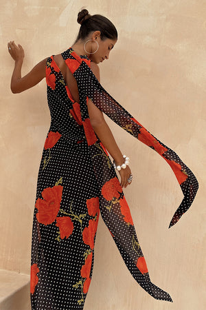 Black Poppy Sophie Dress with a red poppy and polka dot print and statement multi-wear scarf detail.