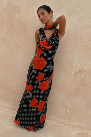 Black Poppy Sophie Dress with a red poppy and polka dot print, featuring a cowl neck and matching scarf.