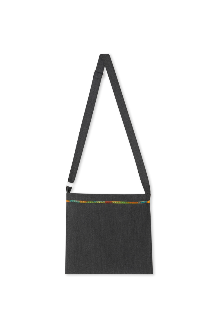 Charcoal Life is Tough Honey Drainage Bag featuring an adjustable crossbody strap and multi-coloured stitched trim.