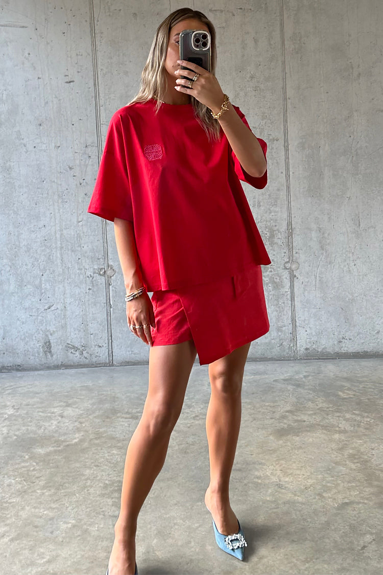 caption_Model wears Red Cotton Mini Jaspre Skirt in UK size 10/ US 6