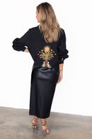 Thumbnail for caption_Model wears Black Running Wilder Miley Shirt in UK size 10/ US 6