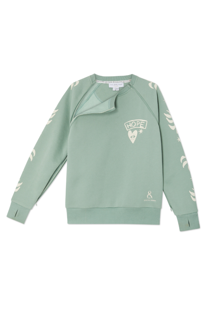 Sage Sundazed Accessible Sweatshirt in sage green with cream palm prints, functional zips, and a 'HOPE' graphic.