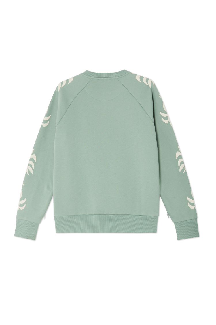 Sage Sundazed Accessible Sweatshirt in sage green with cream palm prints on the sleeves, shown from the back.