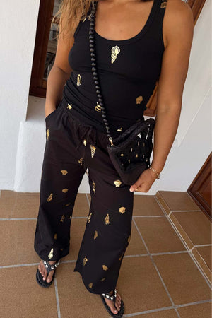 Black Shell Elissa Trousers Petite featuring a gold shell print, wide-leg fit and breathable cotton-linen blend.