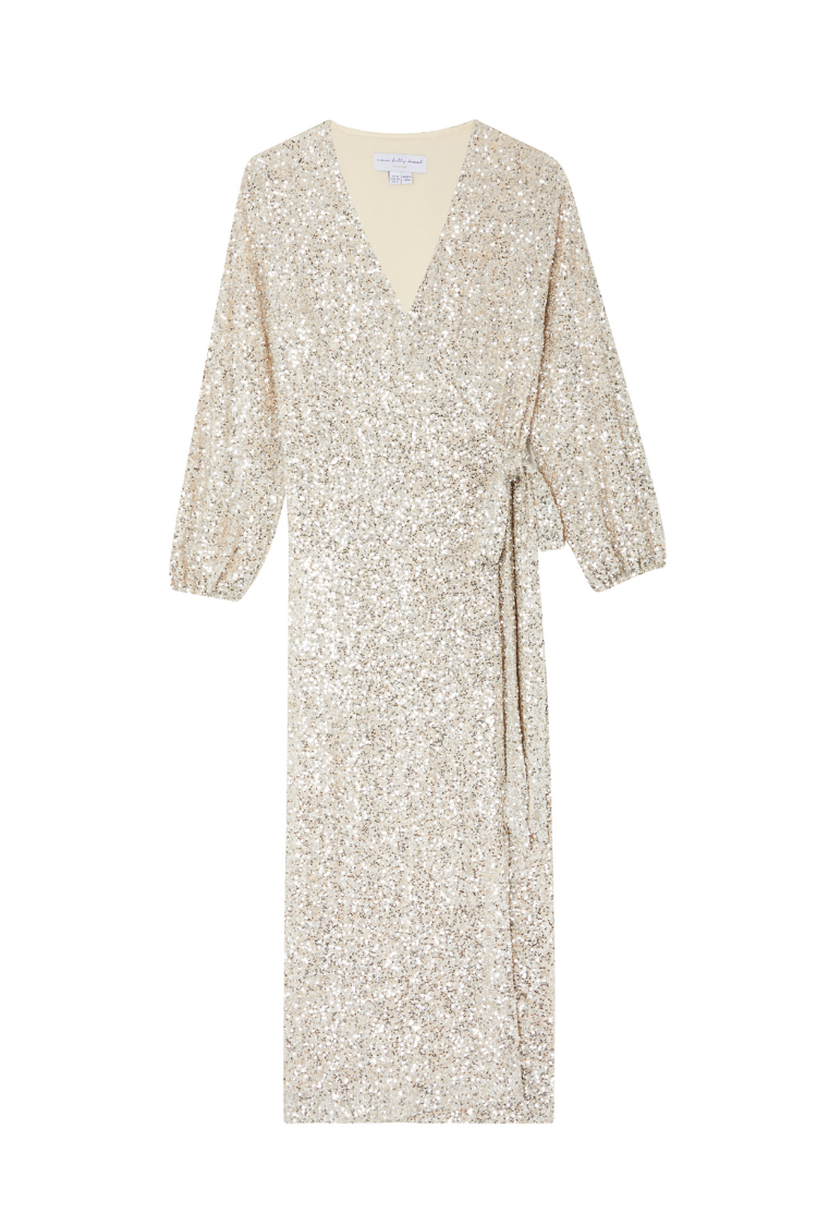 Silver Sequin Kira Wrap Dress with long sleeves, V-neckline and adjustable waist tie on a white background.