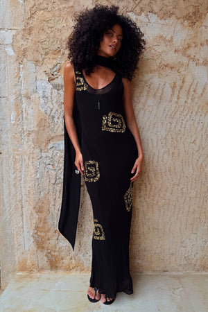 Black & Gold Simona maxi dress with gold sequin detailing and a detachable scarf for multi-wear styling.