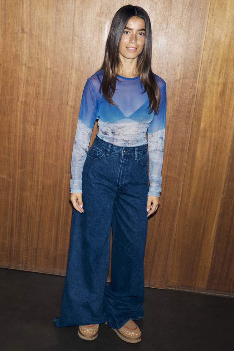 Ski Slopes Mesh Long Sleeve Top in sheer blue mountain print, styled with dark denim wide-leg jeans.