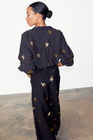 Thumbnail for caption_Model wears Black Gold Snake Elissa Trousers in UK size 10/ US 6