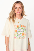 Thumbnail for caption_Model wears Cream Abstract Snake T-shirt  in UK size 10/ US 6