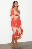 Thumbnail for caption_Model wears Reversible Sundial Wrap Dress in UK size 18 / US 14