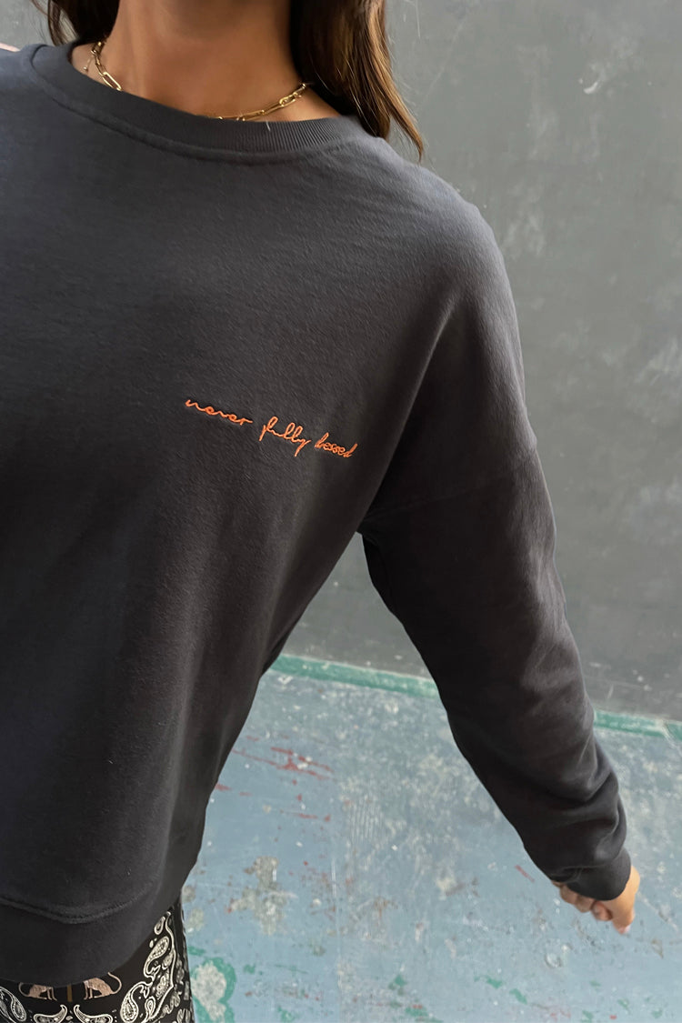 caption_Model wears Charcoal NFD Sweater in UK size 8/ US 4