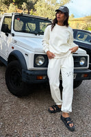 Thumbnail for caption_Model wears White Tattoo Joggers in UK size 10/ US 6