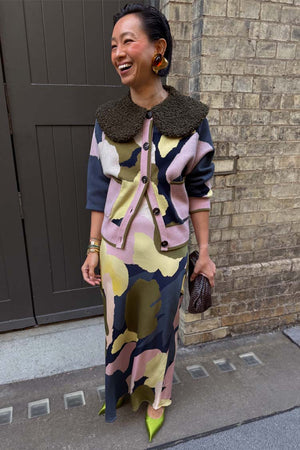 Teal Mara Abstract Cheryl Cardigan with a detachable wool collar, styled as a co-ord with a matching print skirt.