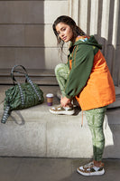 Thumbnail for caption_Model wears Khaki and Orange NFD Windbreaker in UK size 16/ US 12