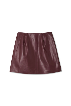 Burgundy vegan leather mini kilt skirt in a rich wine tone featuring pleated side detailing.