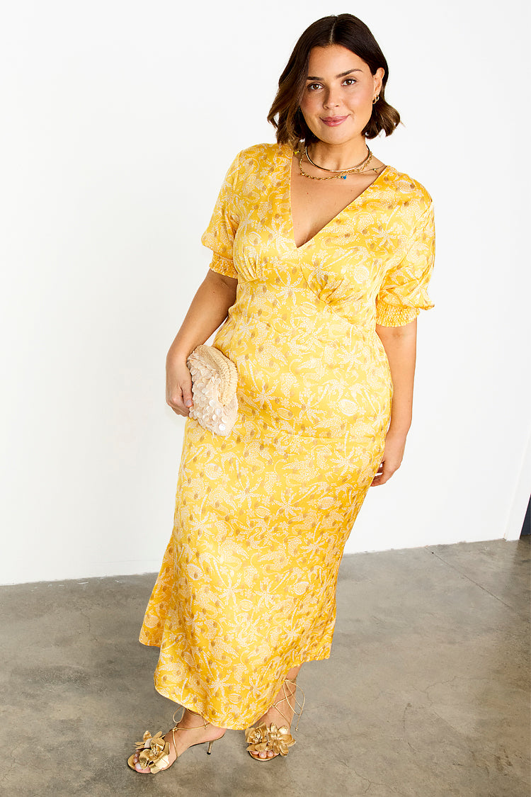caption_Model wears Yellow Mosaic May Dress in UK size 18/ US 14