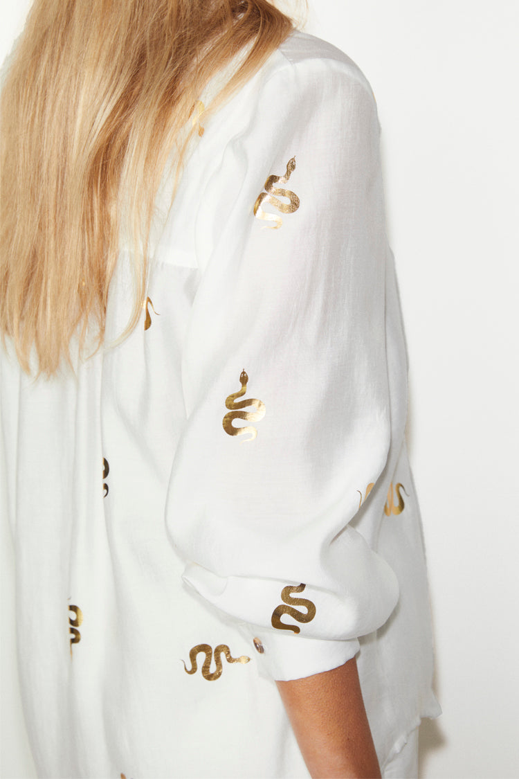 caption_Model wears Gold Snake Miley Shirt in UK size 10/ US 6