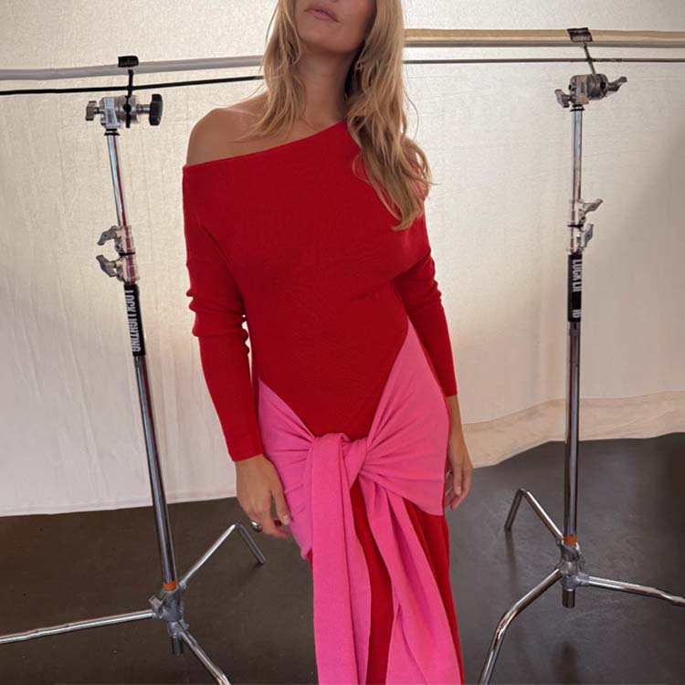 Red and Pink Afia Midi Dress in a soft knit with an off-the-shoulder neckline and contrast wrap tie.