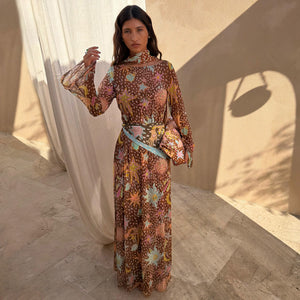 Star Fawn Aria Mesh Dress in brown with sun and star motifs and sheer flared sleeves for feel good dressing.