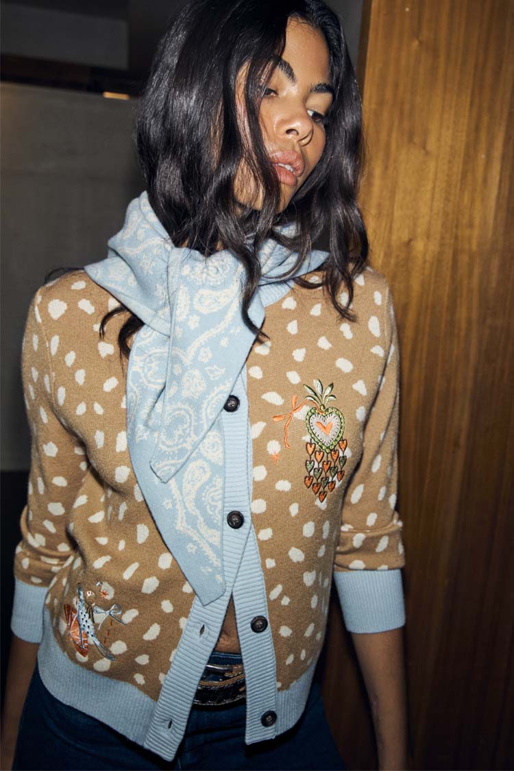 Blush and cream spotted Deer Print Hollie Cardigan with light blue trims and a decorative embroidered heart motif.