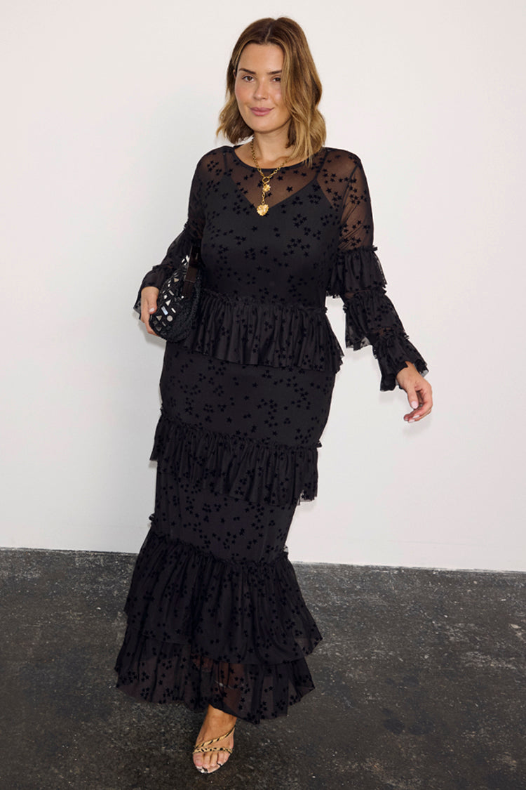 Black Star Devore Felicity Dress featuring tiered mesh ruffles and velvet star motifs on a curve model.