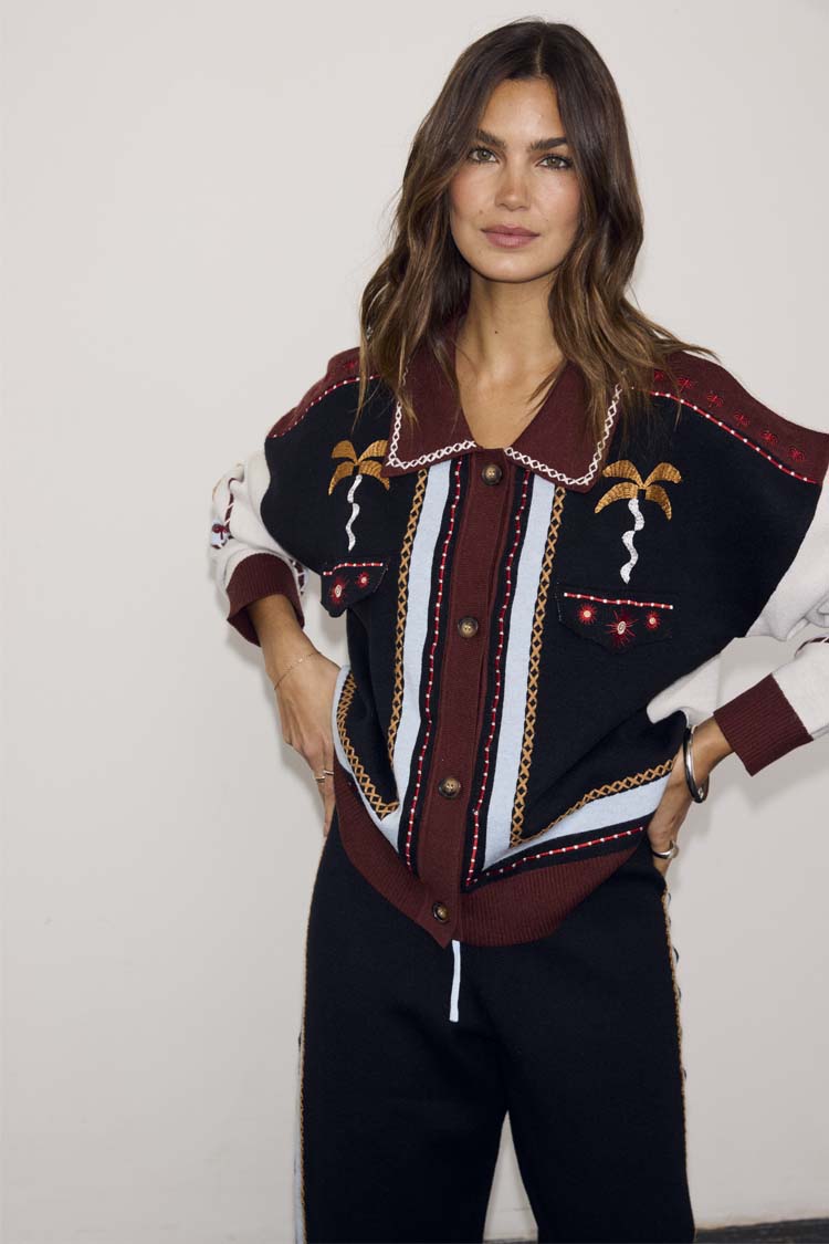Geometric Knit Cardigan featuring the iconic palm motif, blanket stitch trim and button front in warm autumnal tones.