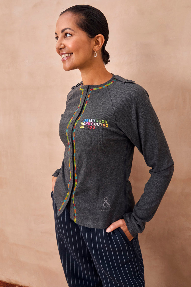 Charcoal Life is Tough Honey T-Shirt featuring multicoloured slogan embroidery and accessible button fastening.