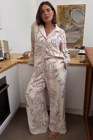 Cream Octopus Button Through Pyjamas featuring a nautical octopus print and relaxed fit in a kitchen setting.