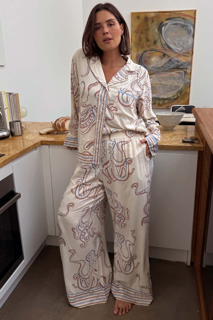 Cream Octopus Button Through Pyjamas featuring a nautical octopus print and relaxed fit in a kitchen setting.
