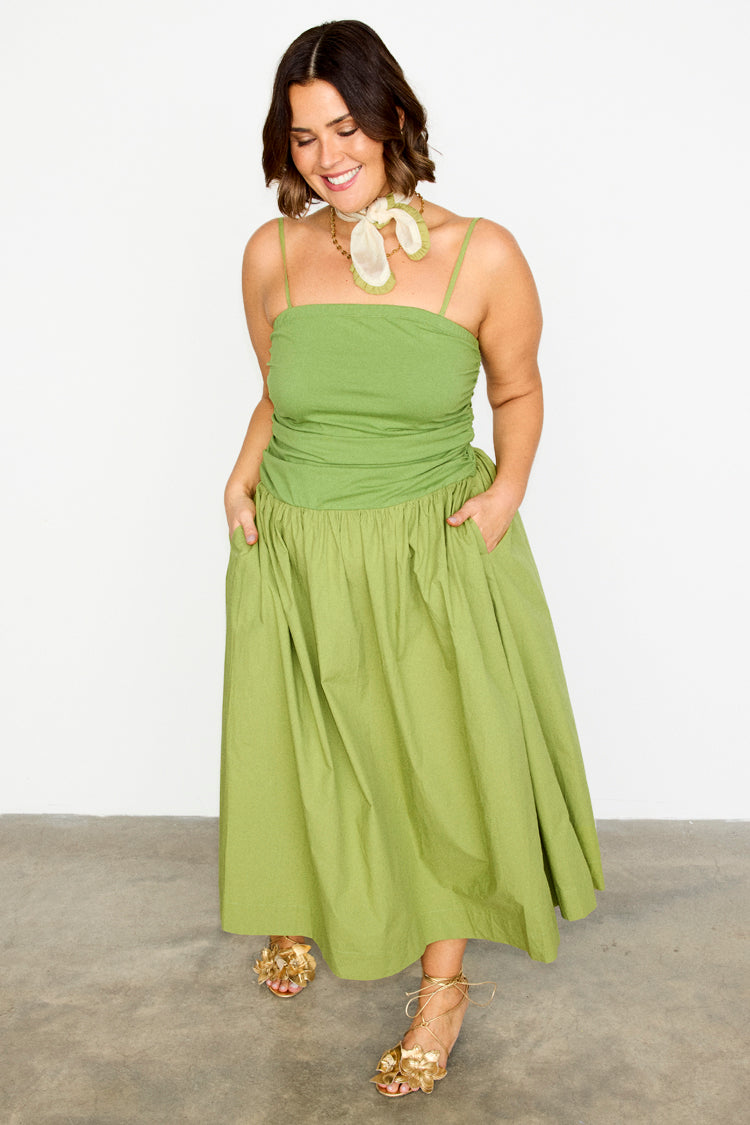 Olive green Lola Mid-axi Dress featuring a ruched bodice and full cotton skirt, designed for inclusive sizing.