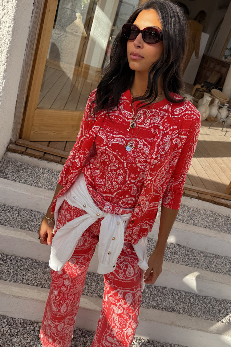Red Bandana Rib Jersey Top featuring 3/4 sleeves and a white paisley print on a red ribbed fabric.