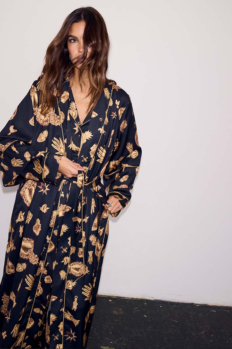 Deloris Satin Robe in black with gold hand, heart and eye motifs, featuring a waist tie fastening.