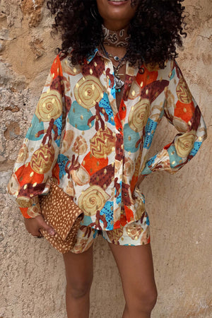 Shell Marley Shirt featuring a multi-colour abstract shell print and metallic detailing, styled as a co-ord.