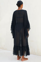 Thumbnail for Model wearing Black Sloane Dress standing facing away from the camera 