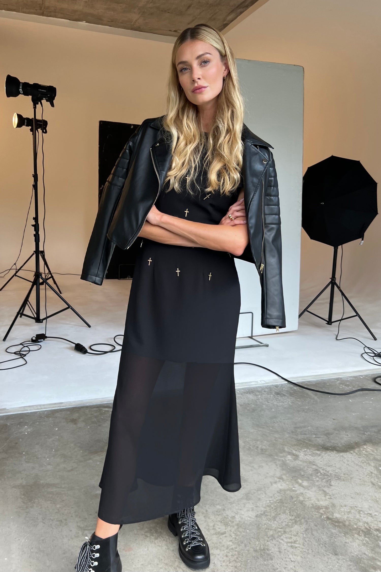 Model wearing Black Leah Dress standing facing the camera