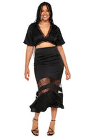Thumbnail for Model wearing Black Lace Crop Top standing facing the camera