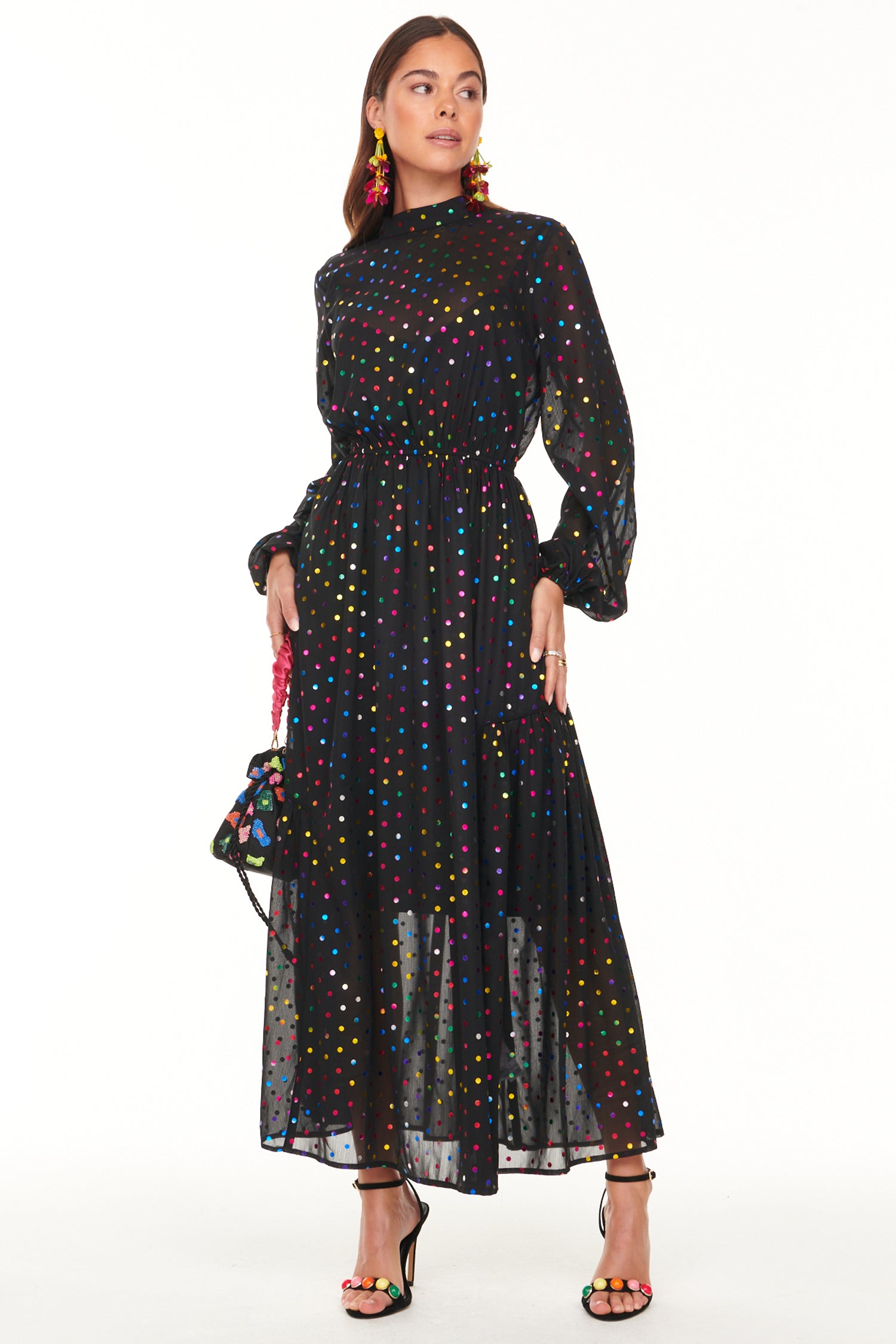 Model wearing Black Mirror Alesha Dress standing facing the camera