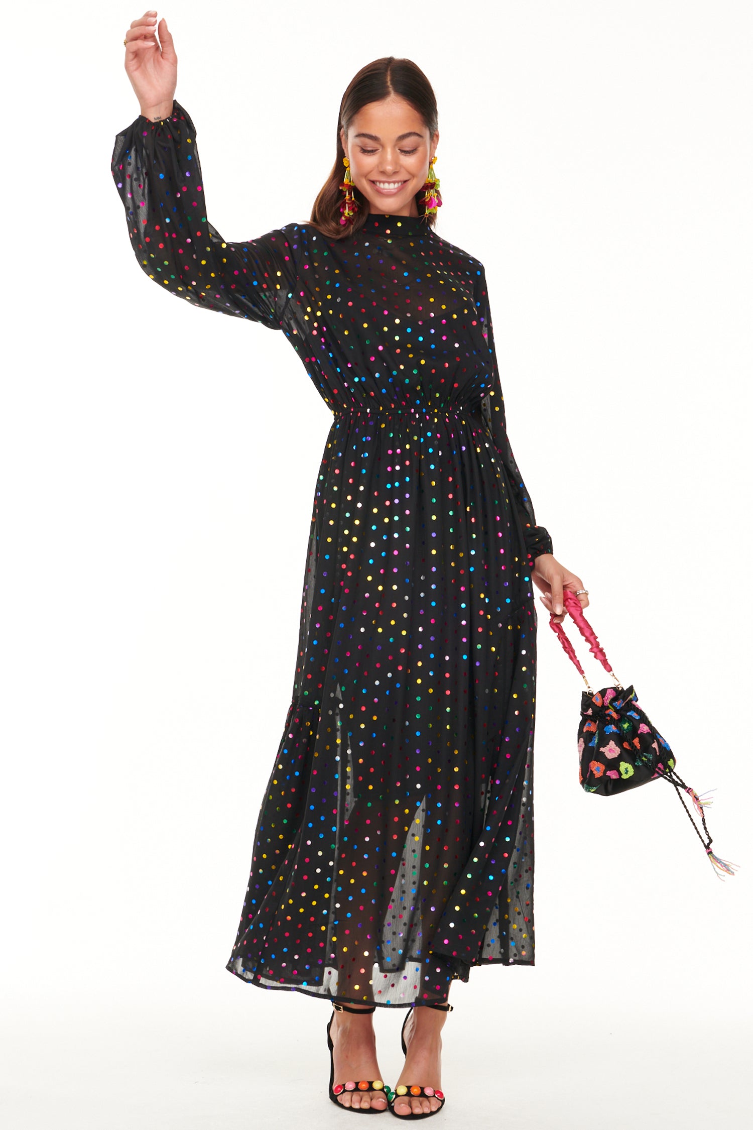 Model wearing Black Mirror Alesha Dress standing facing the camera