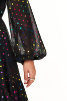 Thumbnail for Model wearing Black Mirror Alesha Dress standing facing the camera close up