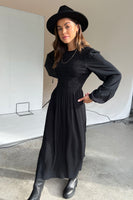 Thumbnail for Model wearing Black Swedish Dress standing facing the camera