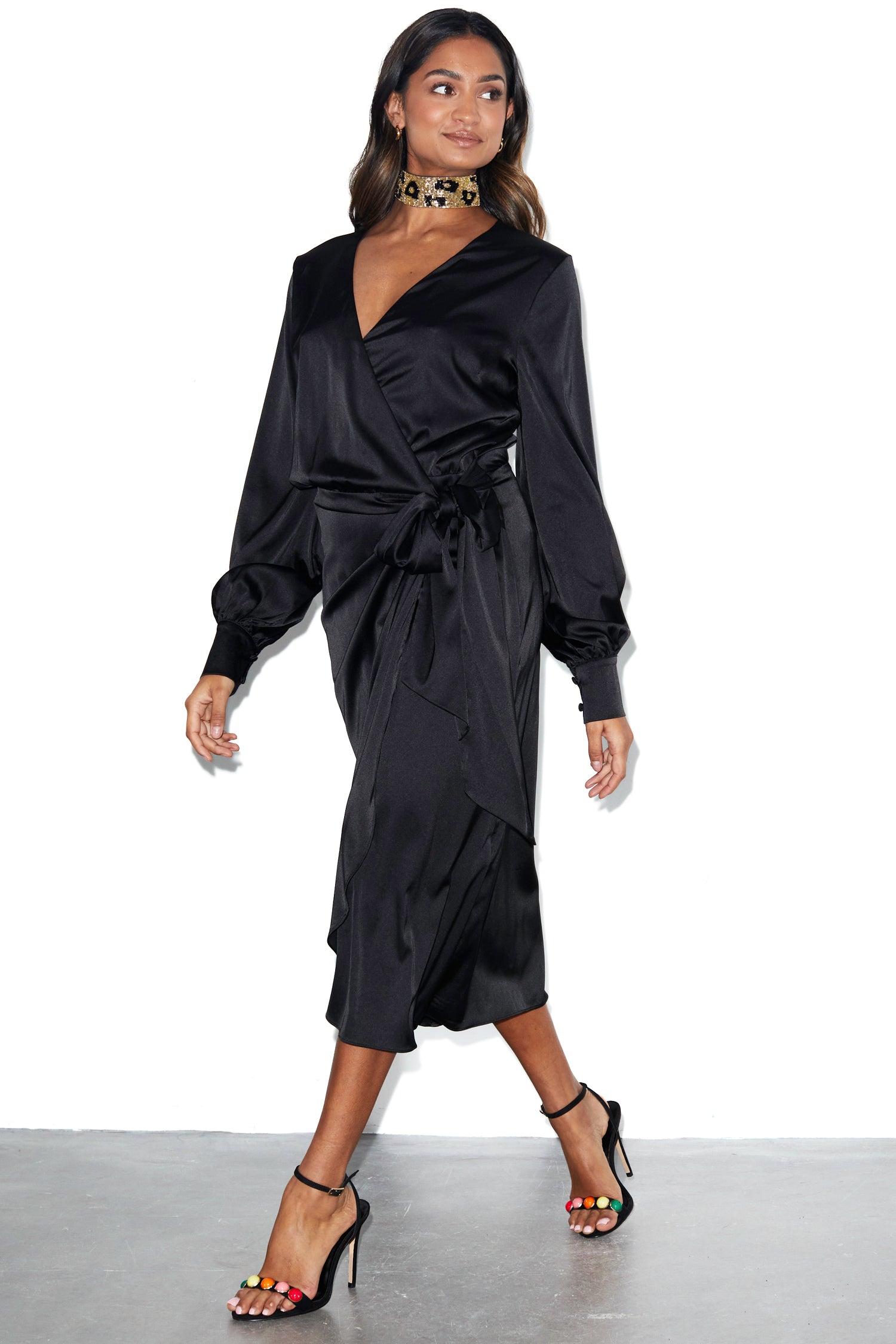 Model wearing Black Midi Vienna Dress standing facing the camera