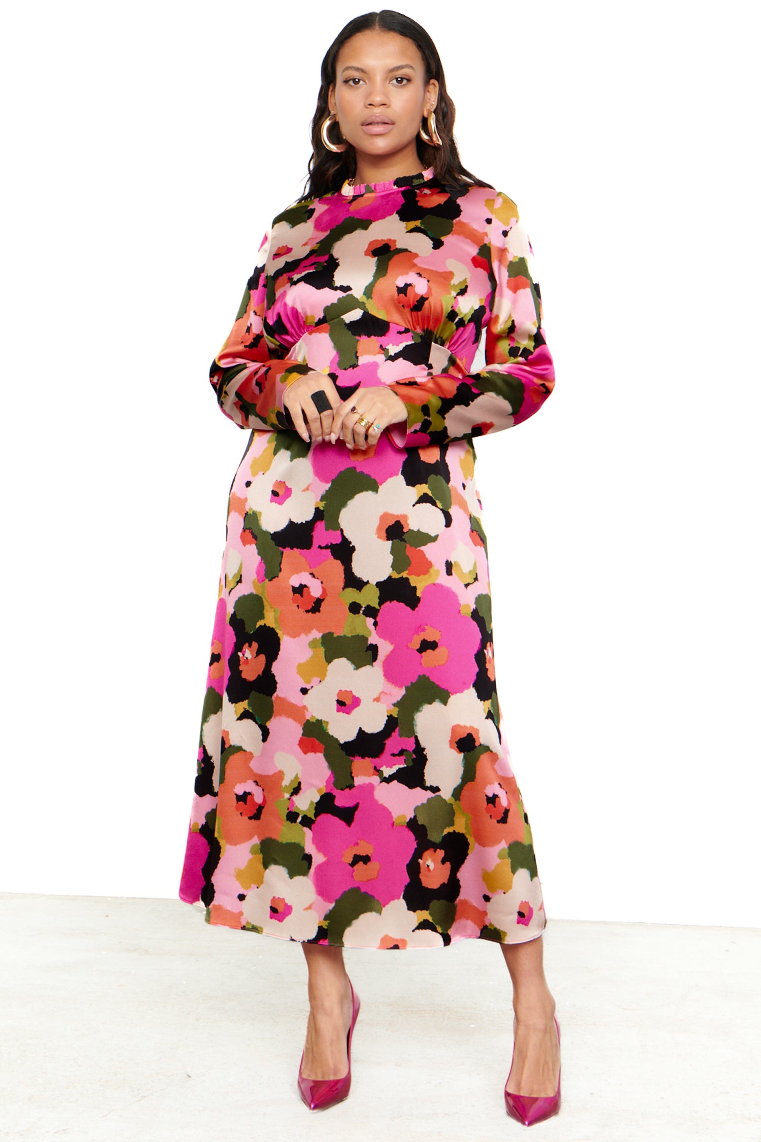 Model wearing Winter Blossom Beau Dress standing facing the camera