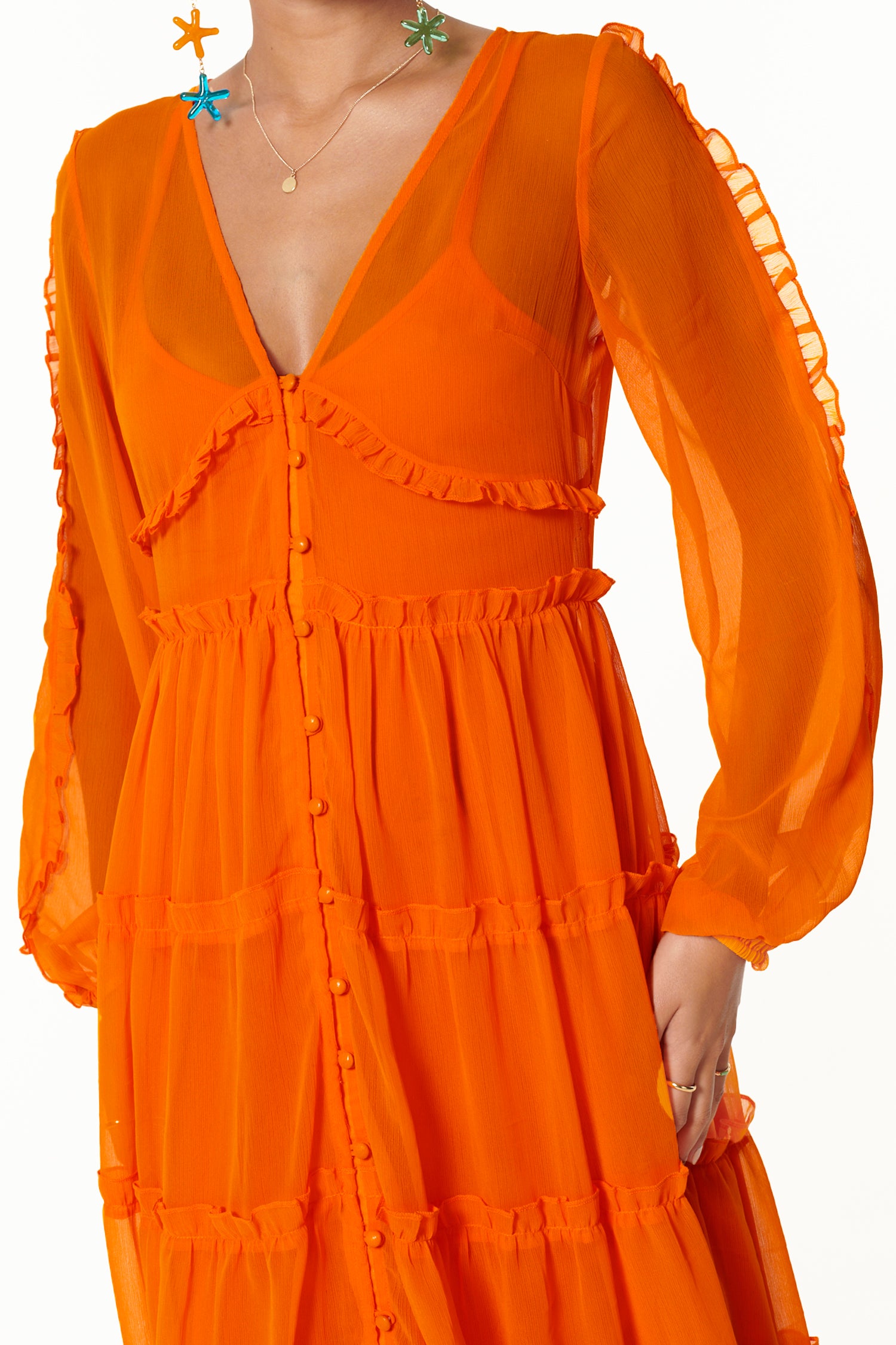 Model wearing Orange Clemmie Dress close up