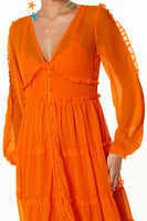 Thumbnail for Model wearing Orange Clemmie Dress close up