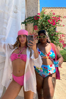 Thumbnail for Model wearing Pink Palm Bikini Top facing the camera
