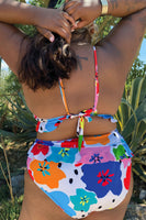 Thumbnail for Model wearing Dotty Bikini Bottom standing facing away from the camera